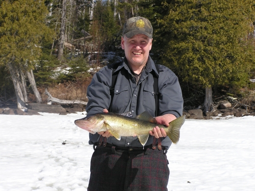 Look at the nice walleye my husband caught ice fishing last March on a lake northwest of Ignace, Ontario.  The day was beautiful and the fishing great - what more could one ask for?