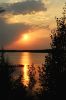 Bright orange sunset on the waters of Wabaskang