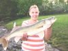 Just wanted to show off the photo of my niece, Kim with her nice catch.  She and a couple of friends were fishing from shore at Flat Rock on Wabigoon Lake when she caught this great walleye - 10.5 lb, 28 inches long and 17