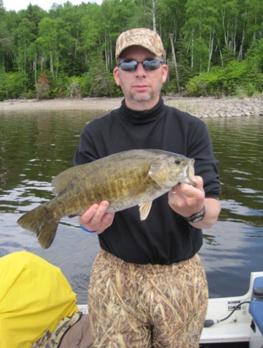 Check out the great catch! Bass is just one of the species of fish you can catch at Lost Island Lodge.