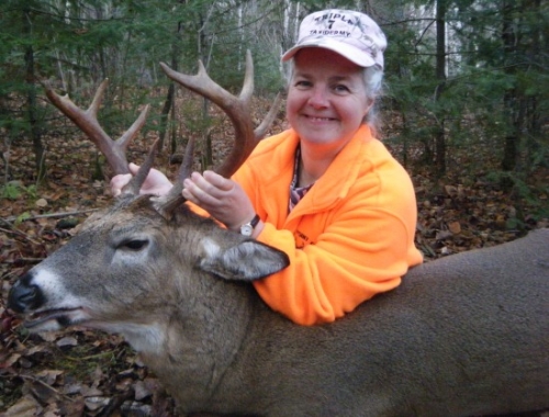 Holly proudly holding up her deer! What could be more delicious than a deer steak for supper? One of the many reasons to hunt in the Patricia Region...