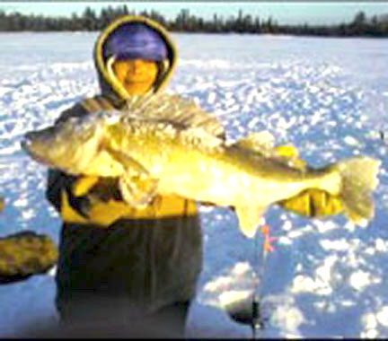 We were told that the photo doesn't do justice to the size of this huge walleye. A young girl from Dryden proudly shows off her catch from Eagle Lake.